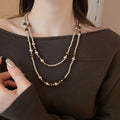 Light Luxury Faux Pearl Tiger Eye Style Geometric Round Sweater Necklace For Women view 3