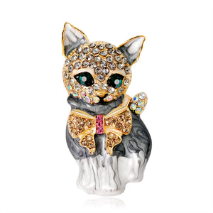 Sitting Cat Brooch in Gray Enamel with a Crystal Face and Gold Bow