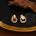Luxury Gold Alloy Double Hoop Twisted Ring Drop Earrings For Women Elegant Statement Metal Earrings view 3