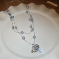 French Light Luxury Rhinestone Saturn Teardrop Faux Pearl Sweater Necklace view 4