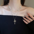 French Light Luxury Rhinestone Saturn Teardrop Faux Pearl Sweater Necklace view 1