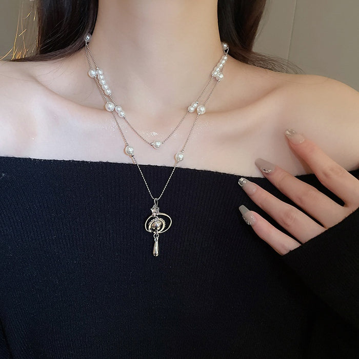 French Light Luxury Rhinestone Saturn Teardrop Faux Pearl Sweater Necklace