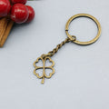 Zinc Alloy Simple Four Leaf Clover Keychain Bag Charm Gift view 6