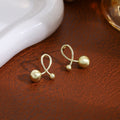 Elegant Gold Brushed Alloy Cross Loop Double Ball Minimalist Stud Earrings view 1