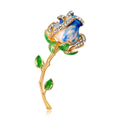 Front product view of the rose brooch pin in gold and green