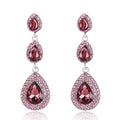 Silver Tone Triple Teardrop Crystal Crystal Four Designs Metal Dangle Earrings view 2