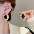 Chic Palace Style Alloy Flower Oval Stud Earrings With Geometric Round Detail view 1