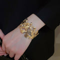 Wide Striped Petal Hollow Open Metal Bangle For Women Light Luxury Statement Cuff Jewelry view 3