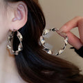 Metal Spiral Round Hoop Earrings For Women Light Luxury Geometric Statement Ear Studs view 3