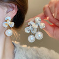 Gold Plated Copper Petal Pearl Stud Earrings With Silver Posts Sweet Vacation Style view 3