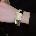 Statement Oval Acrylic Open Bangle With Dragon Bone Texture Minimalist Instagram Style view 4