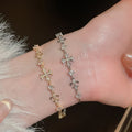Light Luxury Adjustable Copper Zircon Iris Flower Cross Bangle For Women Elegant Floral Jewelry view 1