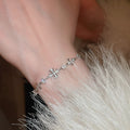 Light Luxury Adjustable Copper Zircon Iris Flower Cross Bangle For Women Elegant Floral Jewelry view 4