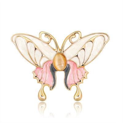 Front product view of the butterfly brooch pin in gold and red