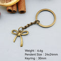 Zinc Alloy Geometric Bow Keychain Bag Charm Gift – Antique Copper view 2