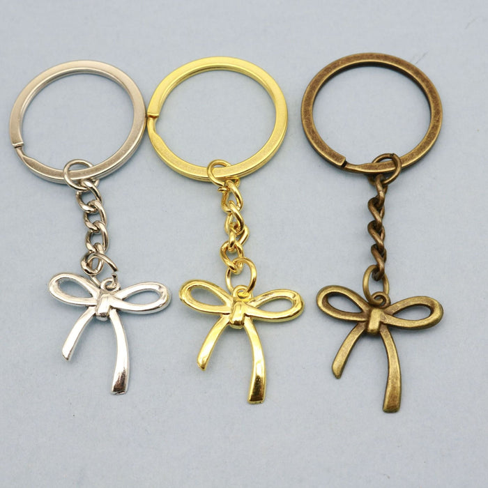 Zinc Alloy Geometric Bow Keychain Bag Charm Gift – Antique Copper