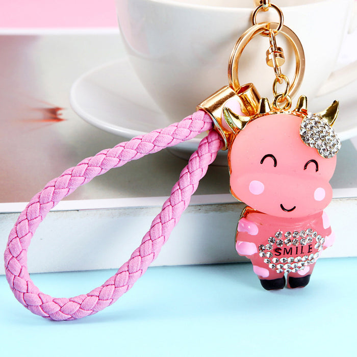 Cow Charm Braided Wrist Strap Keychains in Four Pictured Colors