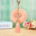 Crown Tassel Plush Pom Pom Keychains in Ten Pictured Colors view 8