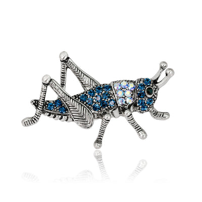 Front product view of the flower brooch pin in silver and blue