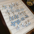 Vintage Light Luxury Butterfly Faux Pearl Gradient Crystal Stud Earrings view 1