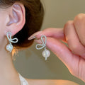 French Vintage Bow Faux Pearl Zircon Stud Earrings With Silver Needle Elegant Light Luxury Jewelry view 2