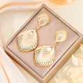 Elegant Textured Alloy Seashell Drop Dangle Earrings For Women Luxury Metal Shell Statement Earrings view 4
