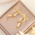 Elegant Gold Alloy Bowknot Ribbon Drop Stud Earrings For Women Sweet Long Dangle Fashion Earrings view 2
