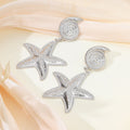 Gold Tone Alloy Spiral Shell And Starfish Drop Dangle Elegant Textured Beach Jewelry Earrings view 3