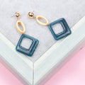 Cream Oval Link Blue Diamond and Yellow Round Drop Stud Earrings view 3