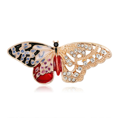 Front product view of the butterfly brooch pin in gold and red