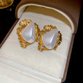 Light Luxury Irregular Wrinkled Triangle Faux Pearl Stud Earrings For Women view 2