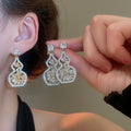 Light Luxury Copper Zircon Flower Hollow Gourd Stud Earrings, New Chinese Geometric Ear Jewelry view 2