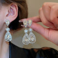 Light Luxury Copper Teardrop Tassel Drop Earrings With Rhinestone Inlay And Silver Pins view 2
