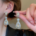 Light Luxury Copper Teardrop Tassel Drop Earrings With Rhinestone Inlay And Silver Pins view 4