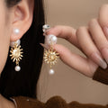 Elegant Korean Sun Face Alloy Drop Earrings With Large Small Pearls Two Way Luxury Pearl Stud Earrings view 1