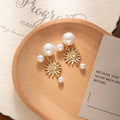 Elegant Korean Sun Face Alloy Drop Earrings With Large Small Pearls Two Way Luxury Pearl Stud Earrings view 4
