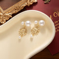 Elegant Korean Sun Face Alloy Drop Earrings With Large Small Pearls Two Way Luxury Pearl Stud Earrings view 3