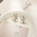 Luxury Polished Alloy Metal Flower Studs With Silver Petals And Gold Ball Center Women's Fashion Earrings view 2
