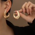 Light Luxury Vintage Gold Alloy Irregular Textured Half Moon C Hoop Stud Statement Earrings view 1