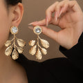 Luxury Vintage Gold Alloy Crystal Rhinestone Hammered Leaf Branch Statement Drop Stud Earrings view 1