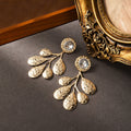 Luxury Vintage Gold Alloy Crystal Rhinestone Hammered Leaf Branch Statement Drop Stud Earrings view 4