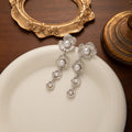 Elegant Vintage Gold Alloy Wrinkled Flower Pearl Inlaid Long Tassel Drop Stud Earrings view 4