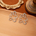 Elegant French Silver Alloy Hammered Hollow Flower Drop Studs With Rhinestone Accent Statement Earrings view 2