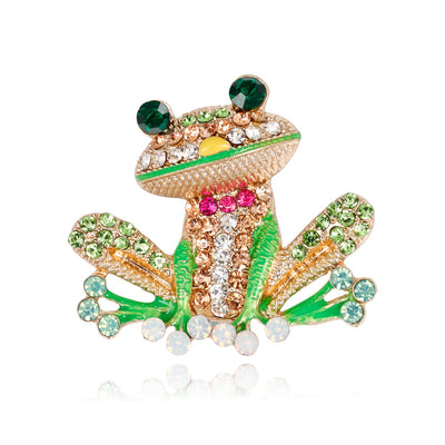 Front product view of the frog brooch pin in gold and green