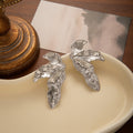 Luxury Irregular Wrinkled Leaf Shape Gold Alloy Statement Stud Earrings For Women Fashion Party Earrings view 4