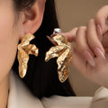 Luxury Irregular Wrinkled Leaf Shape Gold Alloy Statement Stud Earrings For Women Fashion Party Earrings view 1