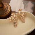 Luxury Irregular Wrinkled Leaf Shape Gold Alloy Statement Stud Earrings For Women Fashion Party Earrings view 3