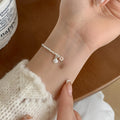 Faux Pearl Starfish Shell Bangle With Crushed Silver Accents, Elegant Niche Fashion Jewelry view 1