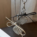 Alloy Bow Charm Sweater Necklace With Braided Heart Bag Pendant Minimalist Fashion Clavicle Chain view 2