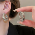 Copper Irregular Round Metal Hoop Earrings With Silver Pins Minimalist Luxury European Style view 2